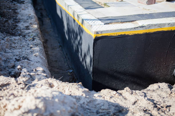 Professional Foundation Crack Repair technician working in Lewis, IN